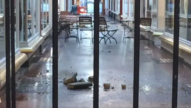 Corridor shopping centre with fallen debri