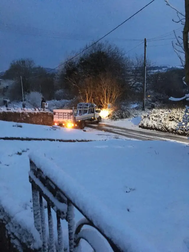 A vehicle struggling on ice