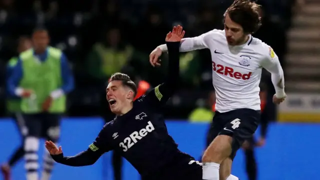 Harry Wilson of Derby County is fouled by Ben Pearson of Preston North End