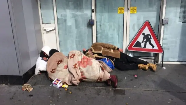 A stock photo of two rough sleepers