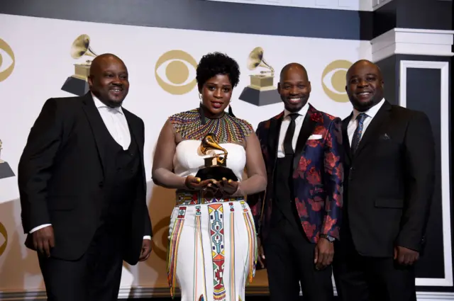 Soweto Gospel Choir, winners of Best World Music Album for 'Freedom,' pose in the press room during the 61st Annual GRAMMY Awards