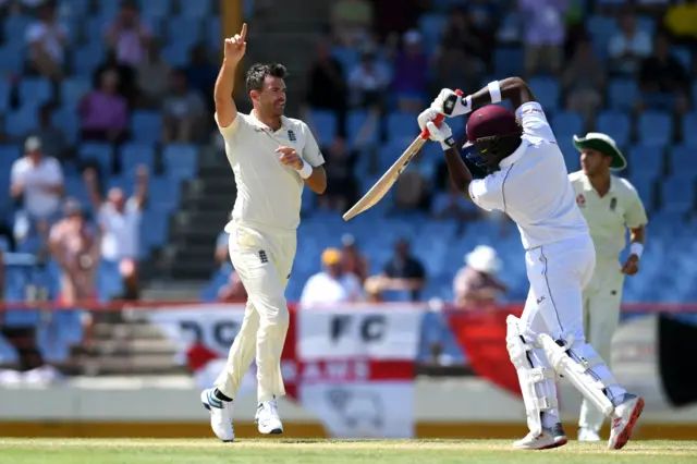 James Anderson of England celebrates taking the wicket of Darren Bravo of the West Indies