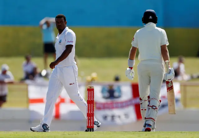 West Indies' Shannon Gabriel and England's Joe Root