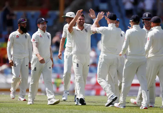 James Anderson celebrates taking the wicket of West Indies' Darren Bravo