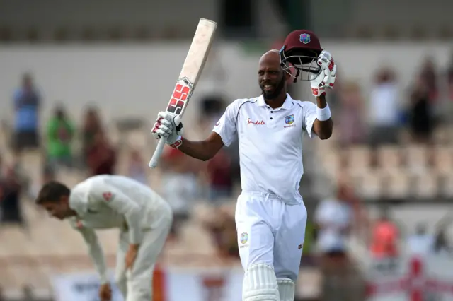 Roston Chase of the West Indies celebrates reaching his century