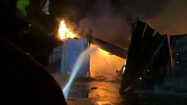 Water being sprayed on the building