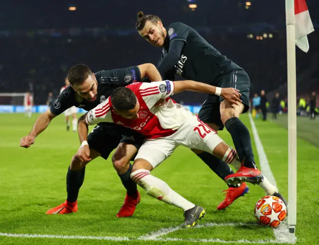 Hakim Ziyech is tackled