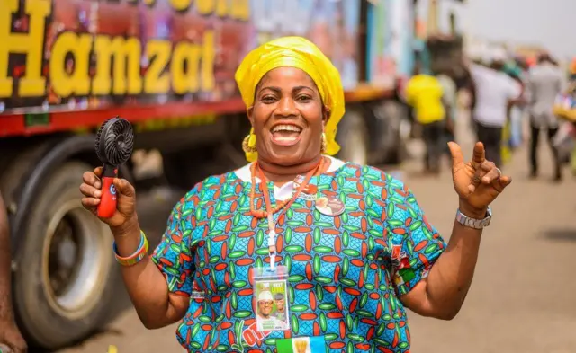 Woman smiling with her arms wide