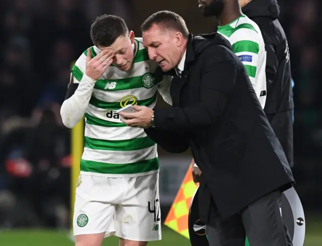 Celtic manager Brendan Rodgers (R) issues instructions to Callum McGregor