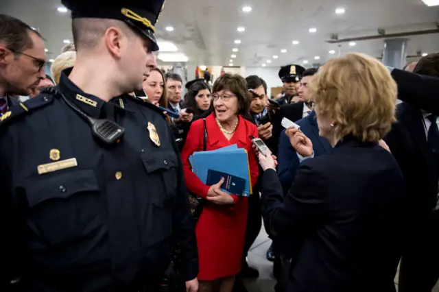 Maine Republican Senator Susan Collins thronged by media at the US Congress