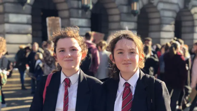 Twins at climate protest