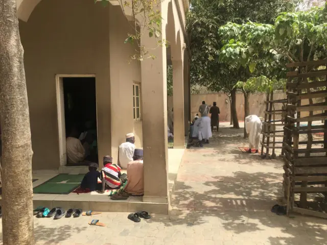 Pictures outside a mosque