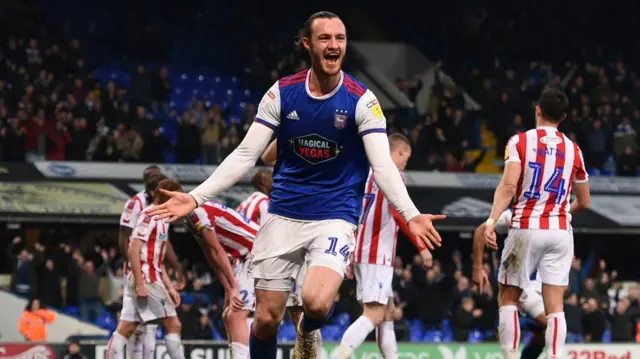 Will Keane celebrates