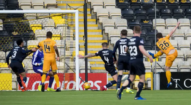 Craig Halkett scores