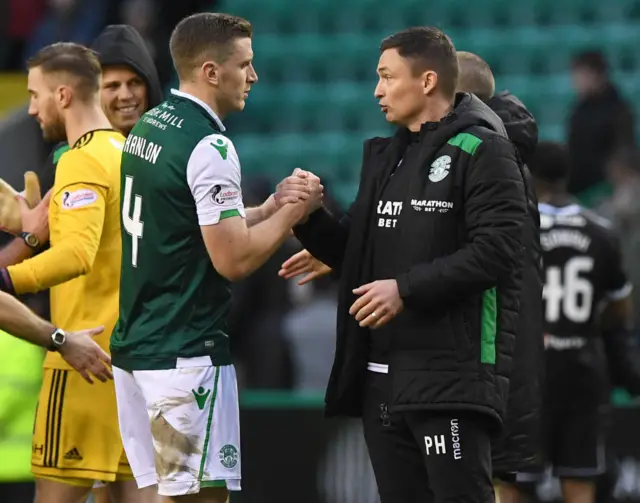 Paul Heckingbottom congratulates Hibs defender Paul Hanlon at full-time