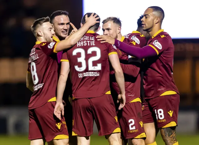 Motherwell players celebrate a goal