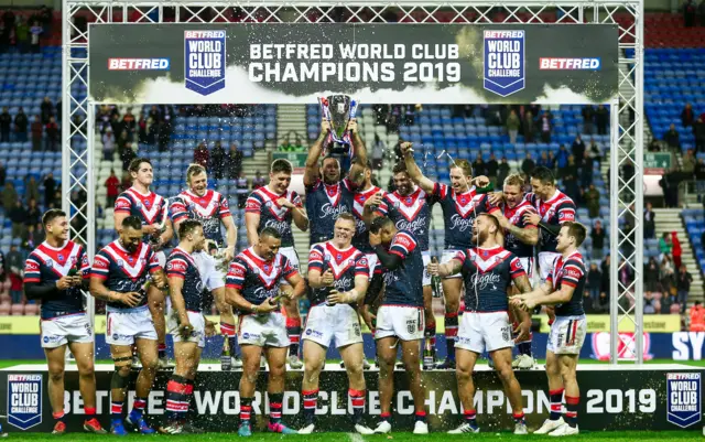 Roosters celebrate with the World Club Challenge trophy