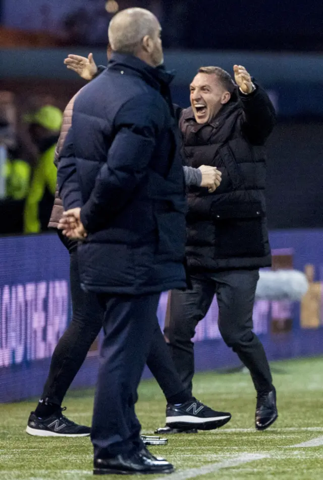 Brendan Rodgers celebrates Celtic's winner as Killie boss Steve Clarke looks on