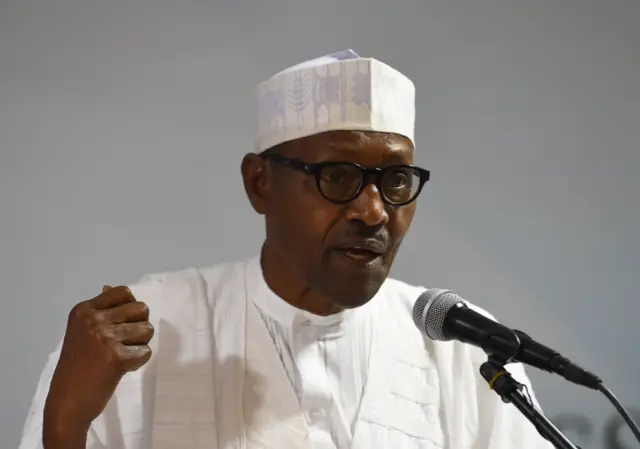 Candidate of the All Progressives Congress (APC) President Mohammadu Buhari delivers a speech during the party caucus emergency meeting on the postponed general elections in Abuja, on February 18, 2019