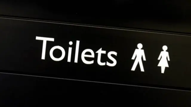 A toilet sign