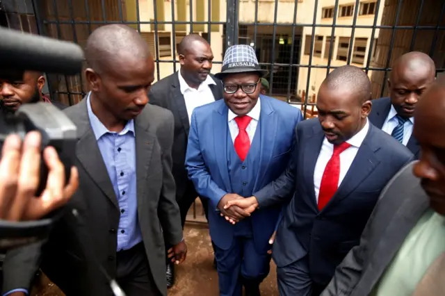 Tendai Biti leaves court after being convicted and fined under the country"s electoral act in Harare, Zimbabwe