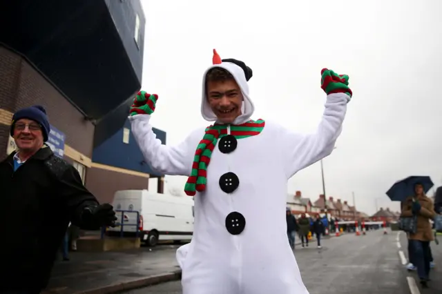 A man dressed as a snowman