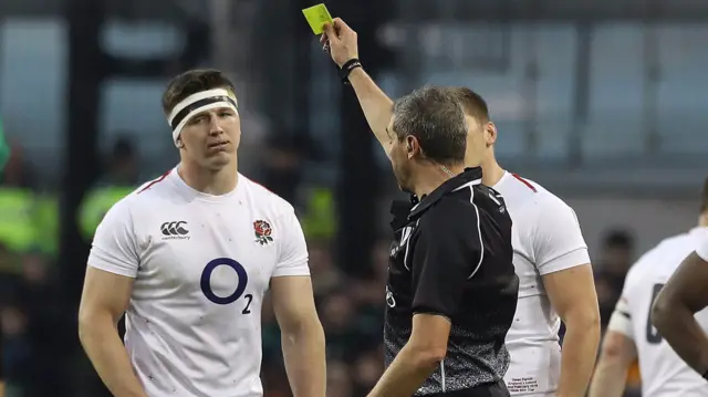 Tom Curry receives a yellow card