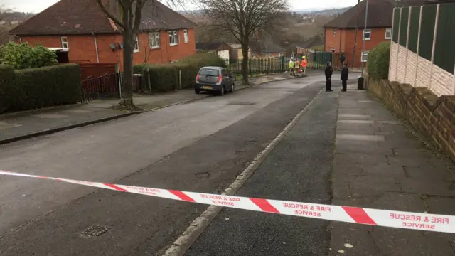 Tape cordoning off road