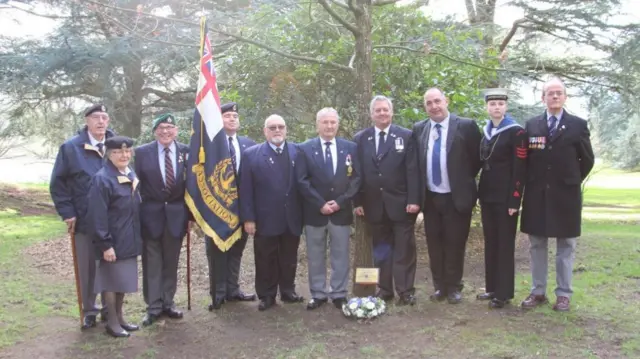 Ex- soldiers with flags