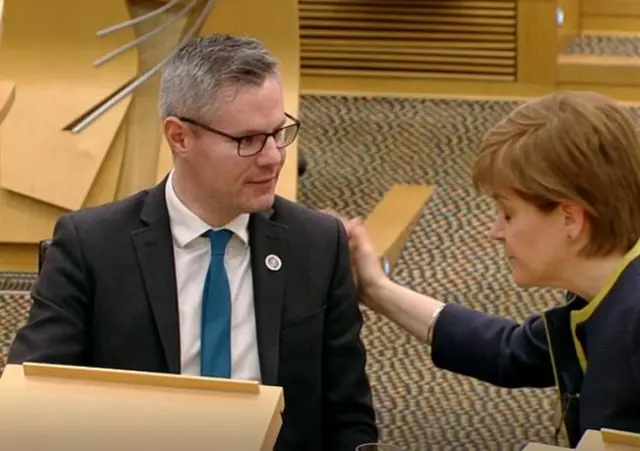 Pat on the shoulder for Derek Mackay