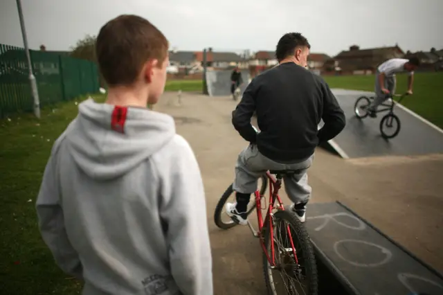 Young people on bikes