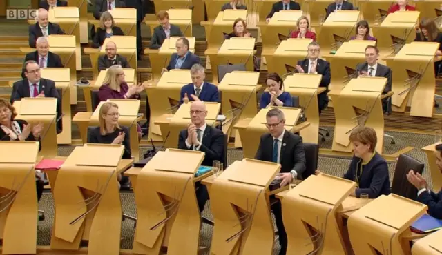 SNP applauding