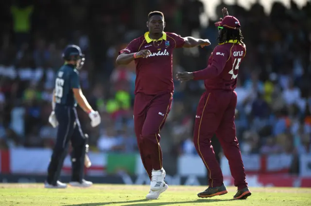 Oshane Thomas celebrates the wicket of Joe Root