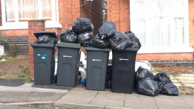 Rubbish piled on bins in Birmingham