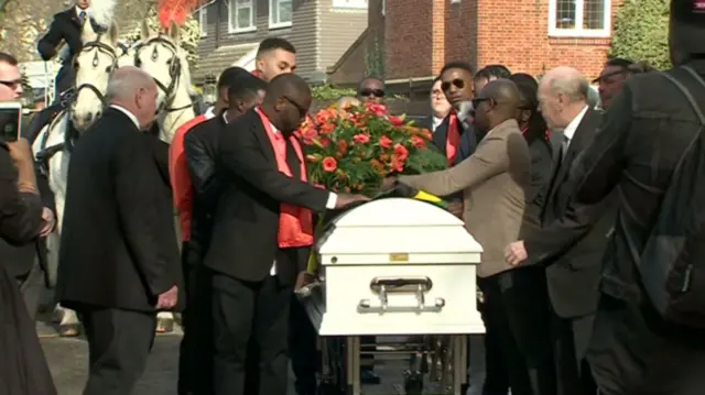 Coffin with flowers