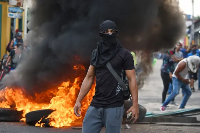 A protester on the Venezuelan side of the border with Colombia