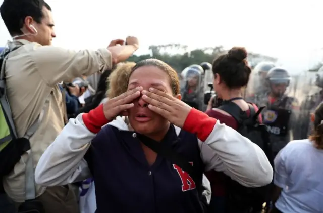 Venezuelans gather at the Simon Bolivar bridge on the border with Venezuela, in Cucuta, Colombia