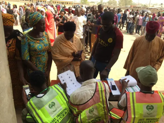 People getting ballot papers