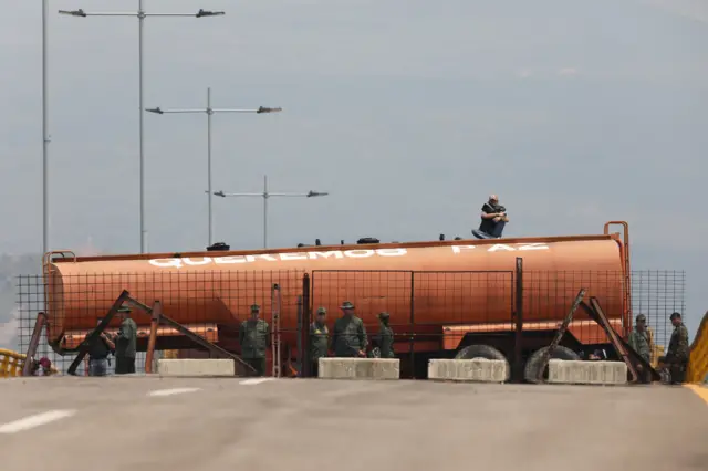 A tanker trailer blocking the Tienditas bridge in the border line between Colombia and Venezuela is seen from the outskirts of Cucuta, Colombia