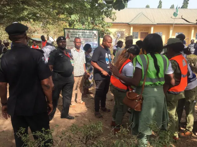 People at a polling station