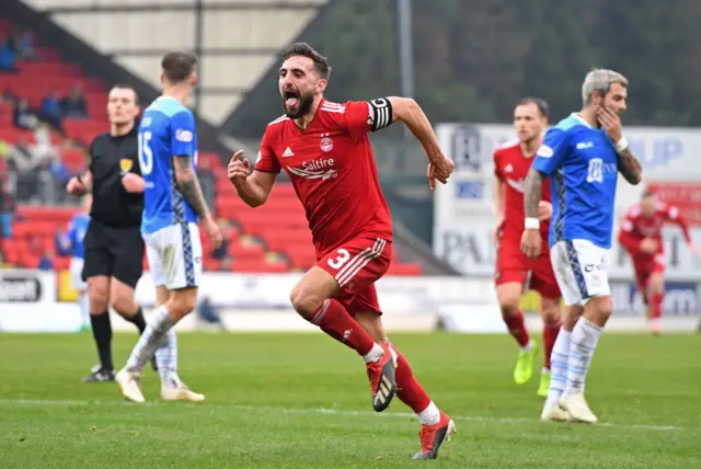 Graeme Shinnie celebrates