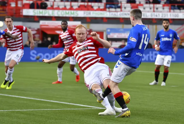 Ziggy Gordon fouls Ryan Kent