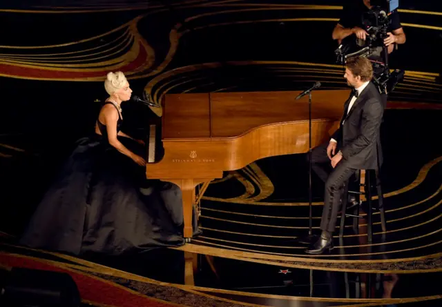 Lady Gaga and Bradley Cooper singing together