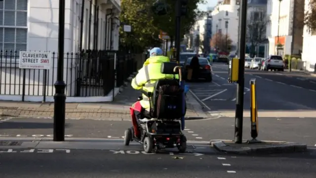 A person using a mobility scooter