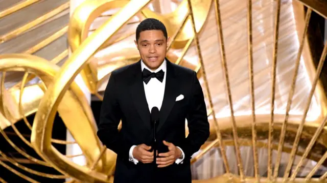 Trevor Noah speaks on stage at the 2019 Academy Awards in Hollywood