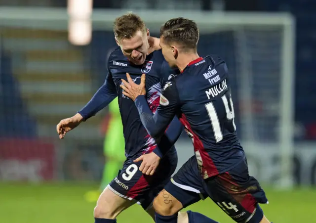 Billy Mckay (left) scored a hat-trick for Ross County