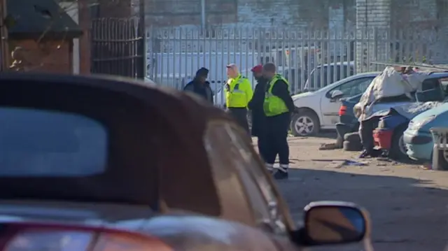 Stand-off at abandoned car site