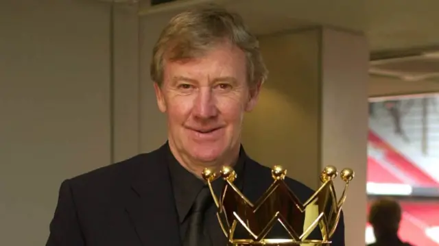 Eric Harrison with the Premier League trophy