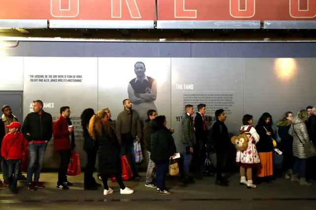 Fans queue to get into the Emirates