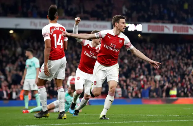 Laurent Koscielny celebrates